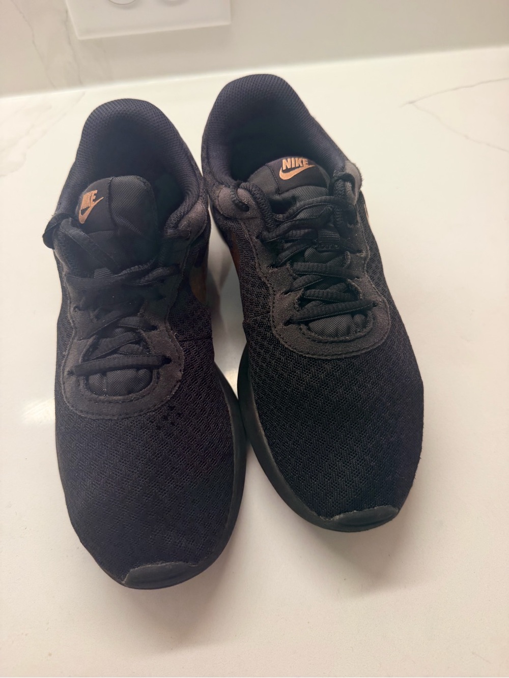 Nike Men’s Black Sneakers with Orange Accents